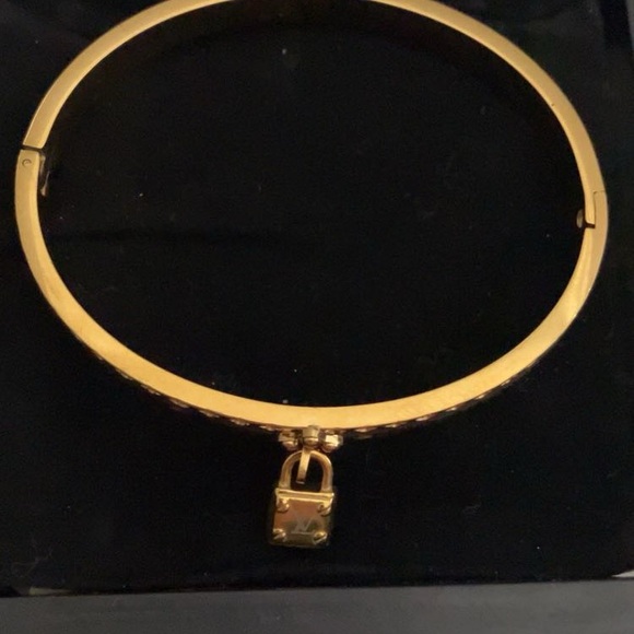 Gold toned and Brown Bangle Bracelet with Lock Charm - Picture 4 of 7